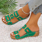 Zomerse strandsandalen voor dames met uitgesneden details en open teenzool en plateauzool.
