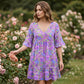 Loszittende damesjurk met V-hals en bohemien bloemenprint